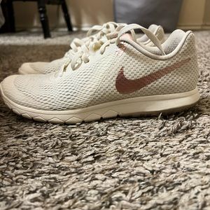 Nike tennis shoes size 7 in rose gold